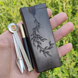 Ebony Dugout with Leafy Branch Engraving